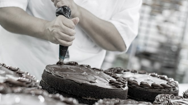 Hand Icing a Cake